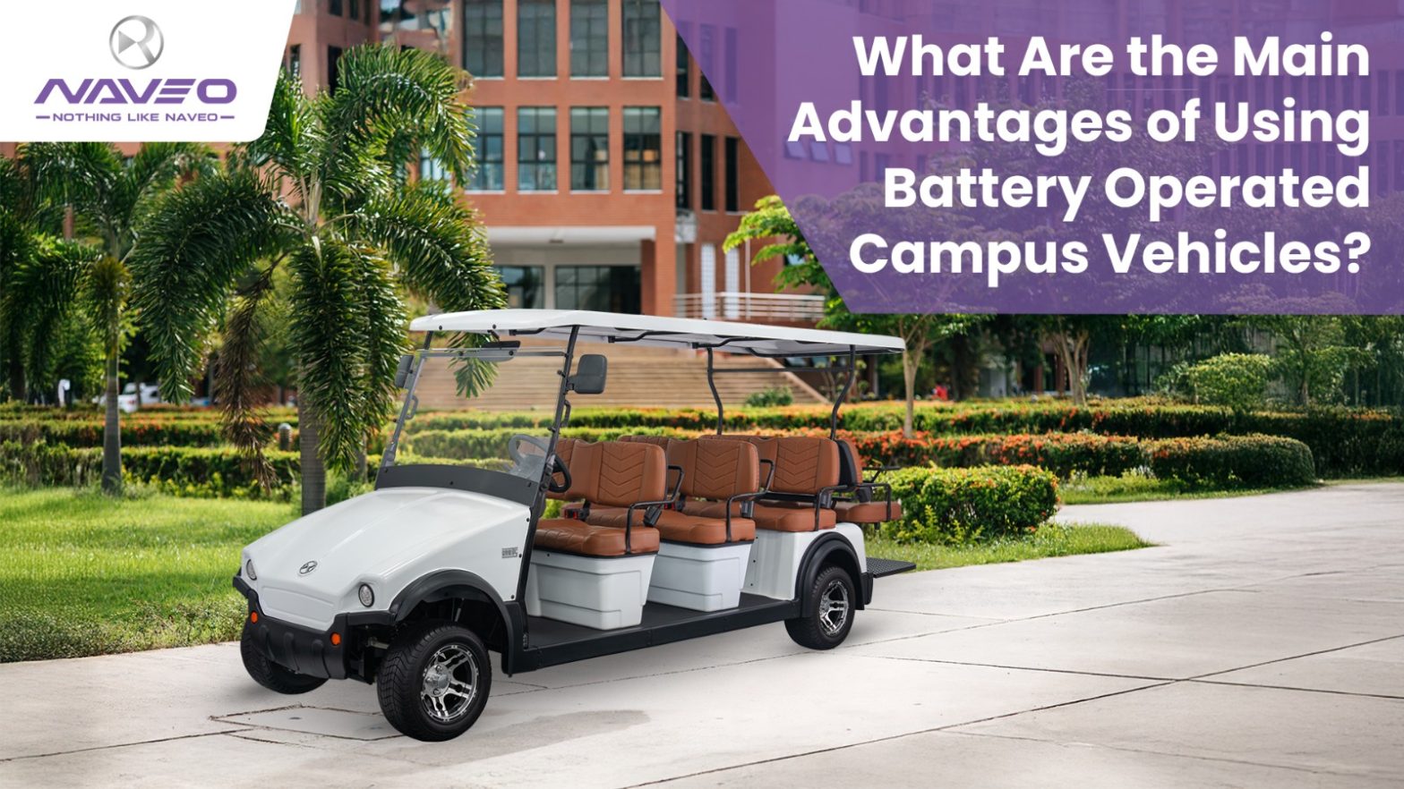 Electric campus vehicle with brown seats on a path surrounded by greenery